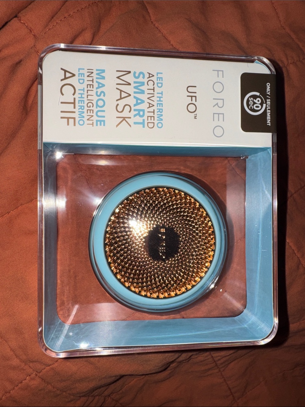 FOREO UFO Smart Mask Device in the color Aqua and Gold